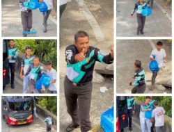 Wujud Kepedulian Polri, Kompol Rusnali Bagikan Nasi Kotak dan Snack di Jalur Ekstrem Sitinjau Lauik